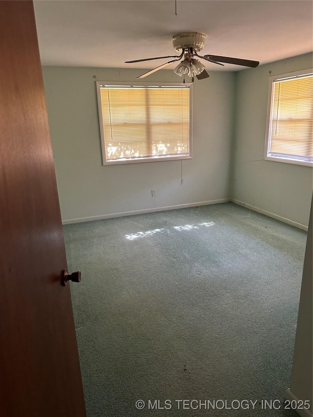 1581 S Velma, Atoka, OK 74525 - empty room featuring carpet and a ceiling fan
