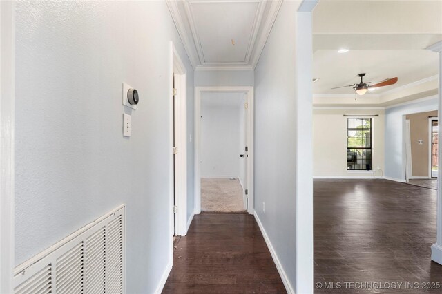 5764 S Carr, Pen, OK 74525 - hall featuring attic access, dark wood-style floors, crown molding, and a raised ceiling
