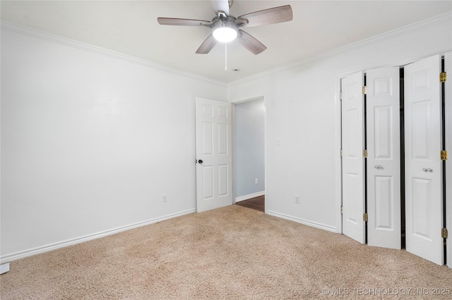 5764 S Carr, Pen, OK 74525 - unfurnished bedroom featuring carpet flooring, crown molding, ceiling fan, and a closet