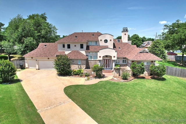 524 S 67th St, Broken Arrow, OK 74014 - mediterranean / spanish house featuring driveway, a garage, and stucco siding