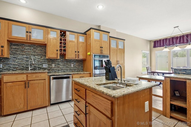 524 S 67th St, Broken Arrow, OK 74014 - kitchen featuring stainless steel dishwasher, light tile patterned floors, tasteful backsplash, decorative light fixtures, and light stone countertops