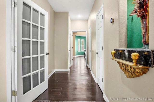 524 S 67th St, Broken Arrow, OK 74014 - hallway featuring dark wood finished floors and baseboards