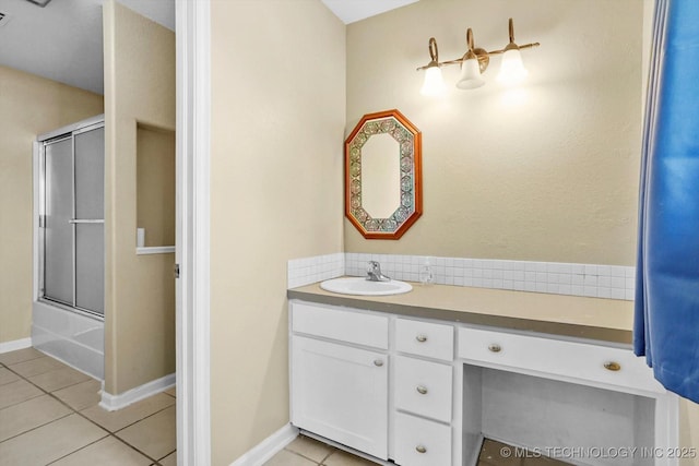 524 S 67th St, Broken Arrow, OK 74014 - full bathroom with tile patterned floors, vanity, and shower / bath combination with glass door