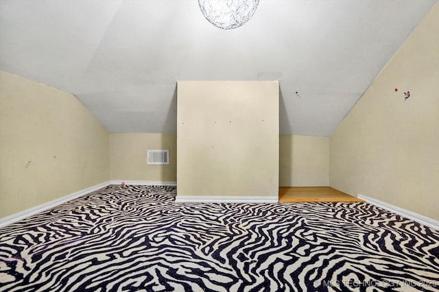 524 S 67th St, Broken Arrow, OK 74014 - bonus room featuring lofted ceiling and light carpet