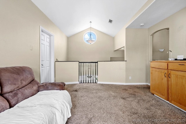 524 S 67th St, Broken Arrow, OK 74014 - sitting room featuring vaulted ceiling, carpet flooring, and arched walkways