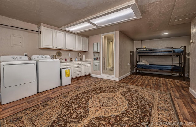 2676 Masters, Sulphur, OK 73086 - laundry area featuring separate washer and dryer, dark wood-type flooring, attic access, and a textured ceiling