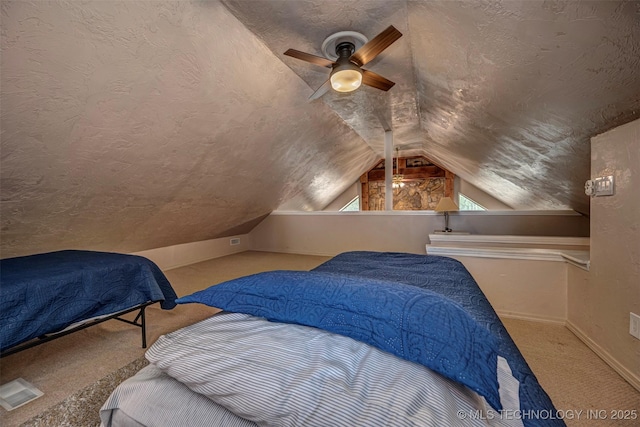 2676 Masters, Sulphur, OK 73086 - bedroom featuring vaulted ceiling, carpet floors, a textured ceiling, and a ceiling fan