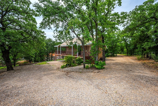 2676 Masters, Sulphur, OK 73086 - obstructed view of property featuring a porch