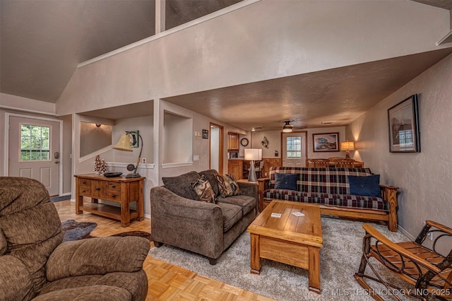2676 Masters, Sulphur, OK 73086 - living room with healthy amount of natural light, a ceiling fan, and a textured wall
