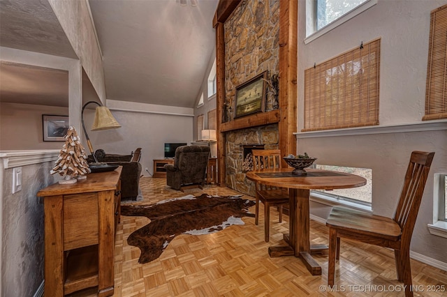 2676 Masters, Sulphur, OK 73086 - dining room with a fireplace and vaulted ceiling