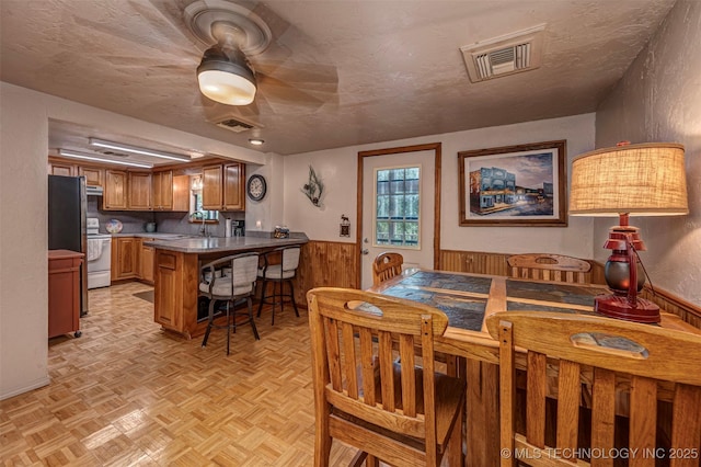 2676 Masters, Sulphur, OK 73086 - dining room featuring a wainscoted wall