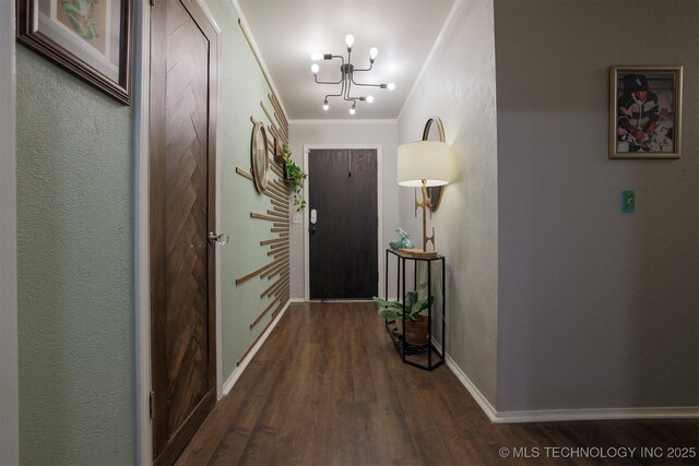 204 W Albuquerque St, Broken Arrow, OK 74011 - foyer featuring a chandelier, wood finished floors, ornamental molding, and a textured wall