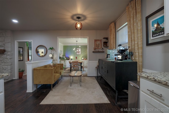 204 W Albuquerque St, Broken Arrow, OK 74011 - living area with dark wood-style flooring and a chandelier