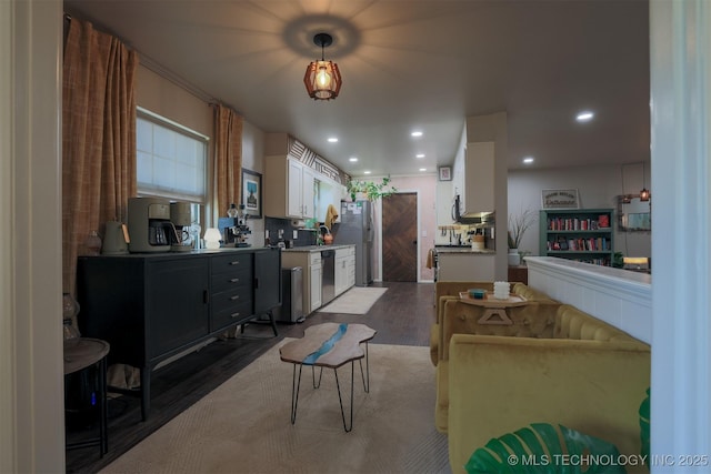 204 W Albuquerque St, Broken Arrow, OK 74011 - living room featuring wood finished floors and recessed lighting