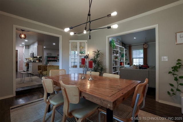 204 W Albuquerque St, Broken Arrow, OK 74011 - dining area with ornamental molding, a chandelier, and dark wood-style floors