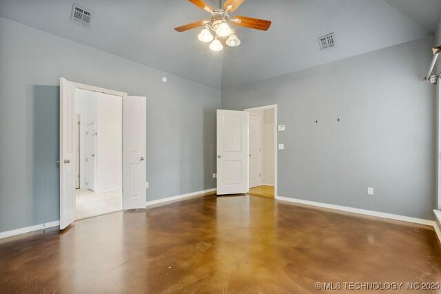 9929 S 85th E Ave, Tulsa, OK 74133 - unfurnished bedroom with finished concrete floors, high vaulted ceiling, and ceiling fan