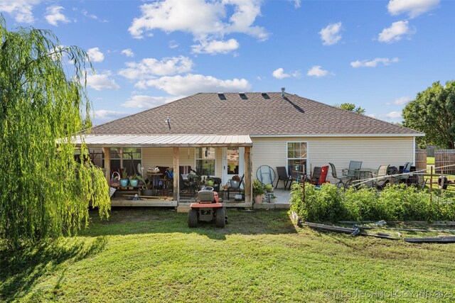 624 S Barclay, Dewey, OK 74029 - rear view of property with a yard, a patio, and a shingled roof