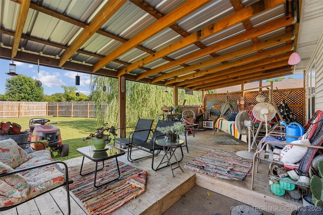 624 S Barclay, Dewey, OK 74029 - fenced backyard with a wooden deck and outdoor lounge area