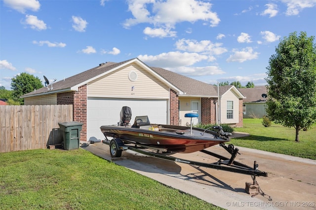 624 S Barclay, Dewey, OK 74029 - ranch-style house with brick siding, concrete driveway, and an attached garage