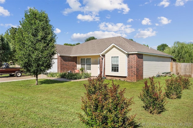 624 S Barclay, Dewey, OK 74029 - ranch-style house featuring brick siding, an attached garage, and concrete driveway