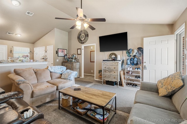 624 S Barclay, Dewey, OK 74029 - living area with lofted ceiling, a ceiling fan, carpet floors, and plenty of natural light