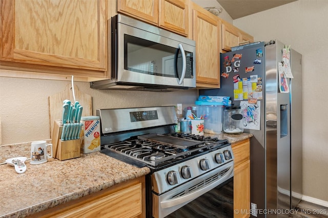 624 S Barclay, Dewey, OK 74029 - kitchen featuring appliances with stainless steel finishes and light brown cabinets