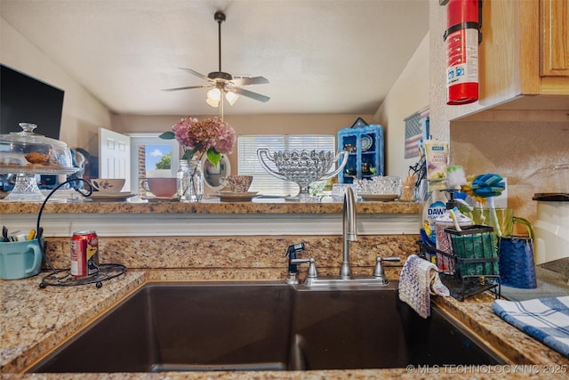 624 S Barclay, Dewey, OK 74029 - kitchen with ceiling fan and light stone countertops