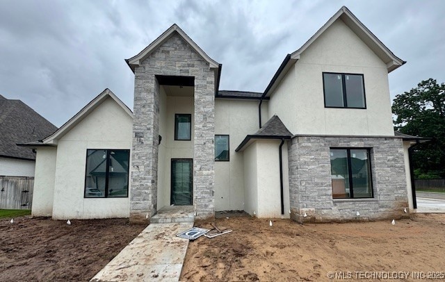 10204 S Florence Ave, Tulsa, OK 74137 - view of front of house featuring stone siding and stucco siding