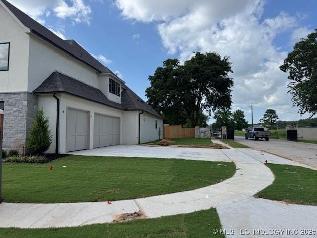 10204 S Florence Ave, Tulsa, OK 74137 - view of yard featuring driveway