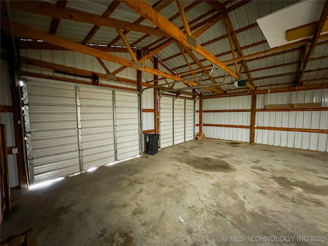 37103 S 4390th Rd, Adair, OK 74330 - garage with metal wall and a garage door opener