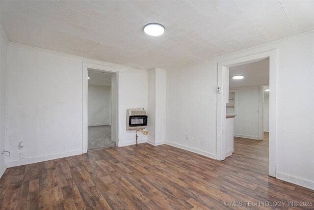816 S Choctaw Ave, Bartlesville, OK 74003 - unfurnished living room with heating unit and wood finished floors