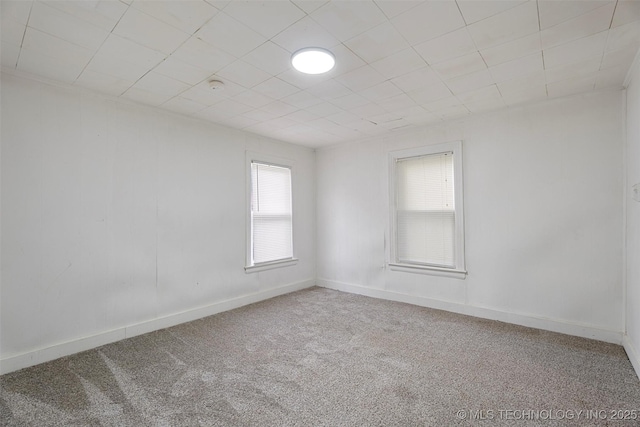 816 S Choctaw Ave, Bartlesville, OK 74003 - unfurnished room featuring carpet and baseboards