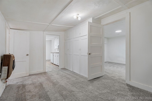 816 S Choctaw Ave, Bartlesville, OK 74003 - interior space featuring light colored carpet, heating unit, and a closet