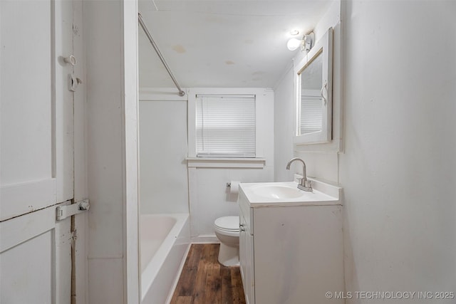816 S Choctaw Ave, Bartlesville, OK 74003 - full bathroom featuring vanity, wood finished floors, and bathtub / shower combination