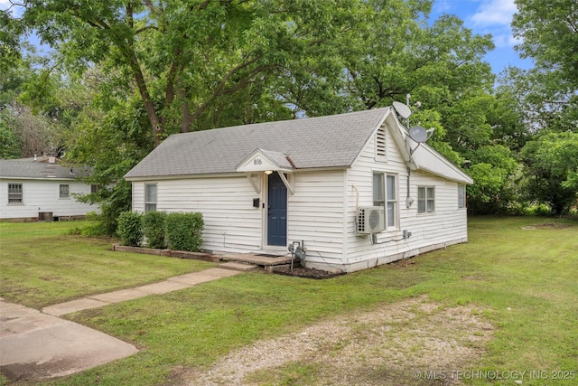 816 S Choctaw Ave, Bartlesville, OK 74003 - bungalow-style house with a front yard, roof with shingles, and view of scattered trees