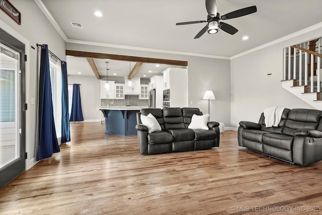 14271 S College Ave, Bixby, OK 74008 - living room featuring light wood-style flooring, stairway, ceiling fan, recessed lighting, and beam ceiling
