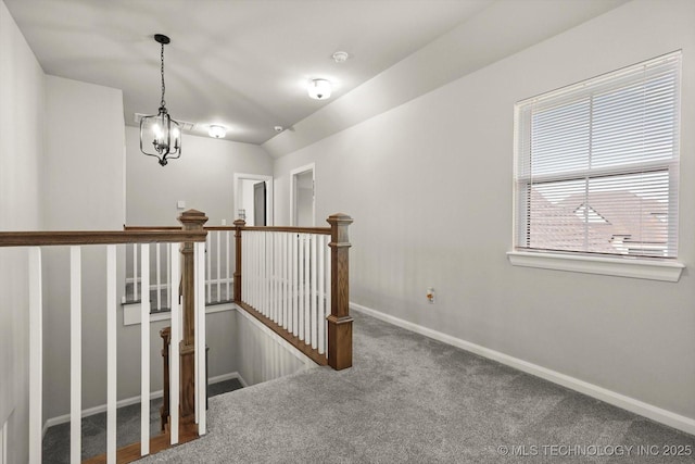 14271 S College Ave, Bixby, OK 74008 - hall with an upstairs landing, carpet floors, and a chandelier