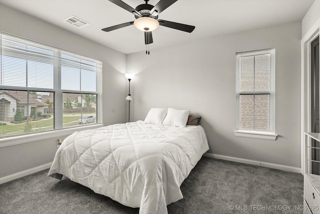 14271 S College Ave, Bixby, OK 74008 - carpeted bedroom featuring baseboards and ceiling fan