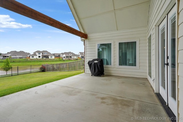 14271 S College Ave, Bixby, OK 74008 - fenced backyard featuring a patio area, a residential view, and area for grilling