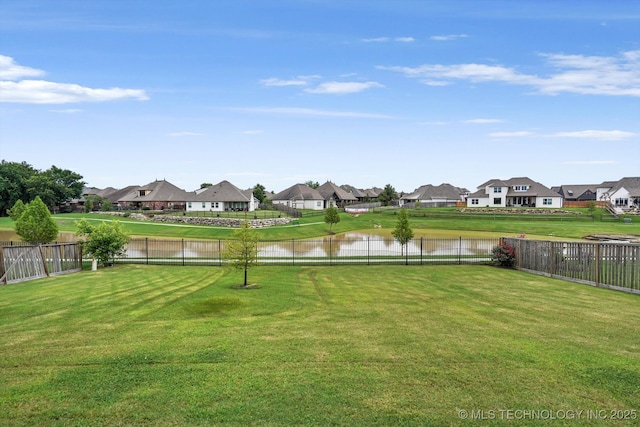 14271 S College Ave, Bixby, OK 74008 - fenced backyard featuring a residential view and a water view
