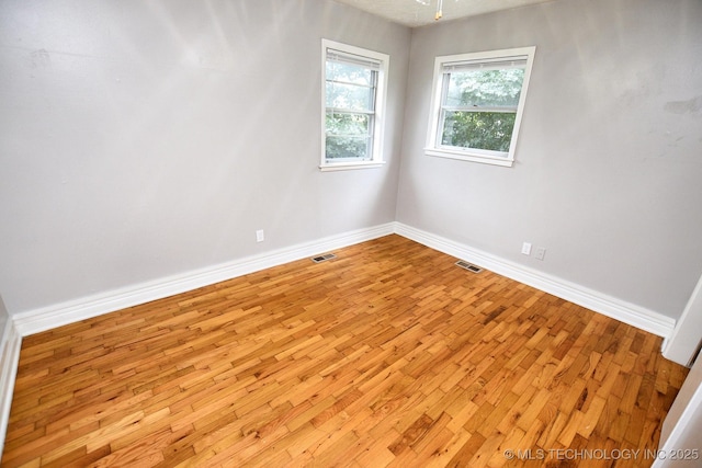 1107 Hillcrest Ave, Tahlequah, OK 74464 - spare room with wood finished floors and baseboards
