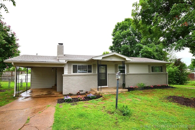 1107 Hillcrest Ave, Tahlequah, OK 74464 - ranch-style house with a carport, brick siding, a chimney, and concrete driveway