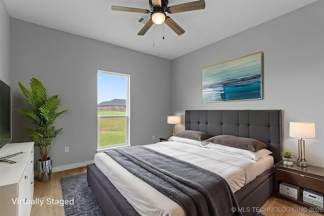 59 Michael, Durant, OK 74730 - bedroom featuring light wood-style floors and a ceiling fan