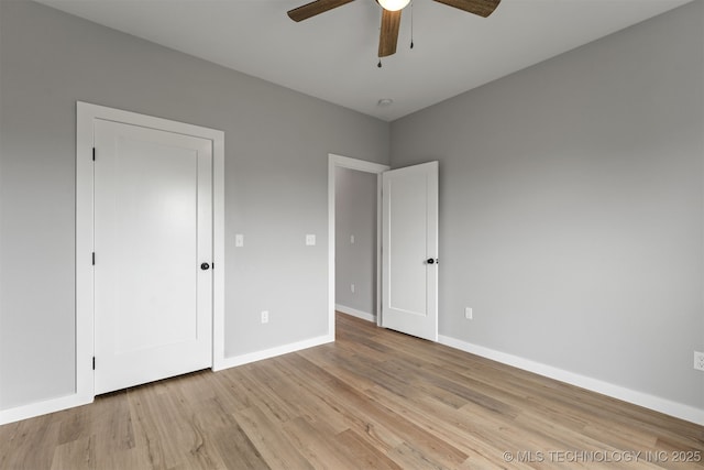 59 Michael, Durant, OK 74730 - unfurnished bedroom featuring light wood-style floors and ceiling fan