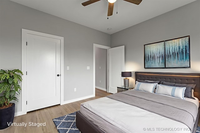 59 Michael, Durant, OK 74730 - bedroom with wood finished floors and a ceiling fan