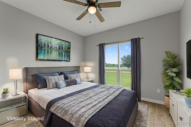59 Michael, Durant, OK 74730 - bedroom featuring light wood-style flooring and a ceiling fan