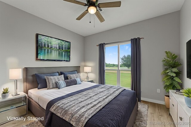 59 Michael, Durant, OK 74730 - bedroom featuring light wood-style flooring and a ceiling fan