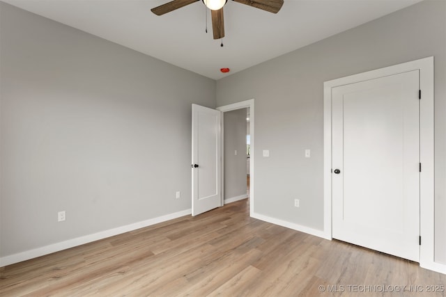 59 Michael, Durant, OK 74730 - unfurnished bedroom with light wood finished floors and ceiling fan