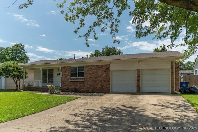 1632 E 55th Pl, Tulsa, OK 74105 - single story home featuring brick siding, concrete driveway, an attached garage, and crawl space
