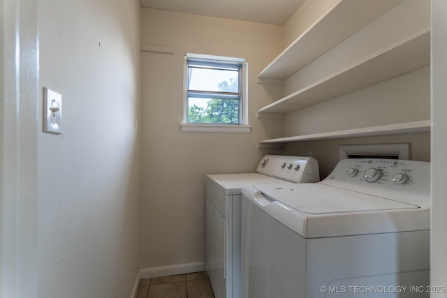 1632 E 55th Pl, Tulsa, OK 74105 - washroom with washing machine and dryer and light tile patterned floors